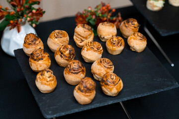 small cakes on black, catering