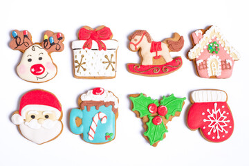 Christmas background with homemade gingerbread cookies on white, isolated Christmas handmade gingerbread cookies on white background, Christmas holidays desserts, top view