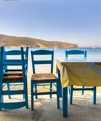 A restaurant on Vathi Beach, Sifnos. The beach stretches for more than 1 km and is a very popular place for sailboats to stop with its perfect sheltered harbour