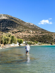 Vathi Beach on Sifnos Island, Greece, stretches for more than 1 kilometer and a very popular place for sailboats to stop, with a perfect sheltered harbour