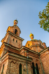 Fototapeta premium Towers and Facade of the orthodox church in Kuldiga, Latvia