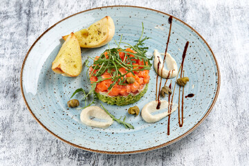 salmon tartare with avocado and lemon