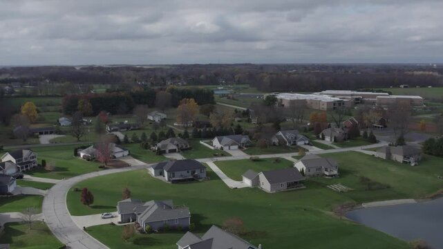 Aerial pullback of fine homes in a rural Indiana neighborhood