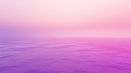 A serene ocean view during sunset, featuring a gradient of soft purple and pink hues across the calm water.