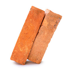 Side view of old red or orange bricks in stack isolated on white background with clipping path