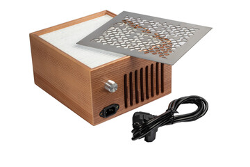 Extractor fan for manicure. Collects dust, cleans air. Light background.