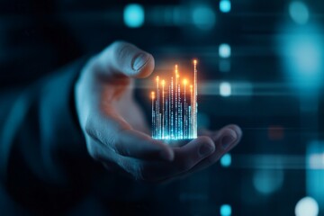 A hand presents a futuristic data visualization as a hologram, representing innovation, digital transformation, and the interface of technology and human touch.