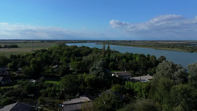 aerial voyage up the Nicesolo Canal north of Venice, near Casoni di Caorle, a traditional fishing village and bike path where modern day seafood such as clams and oysters are harvested today