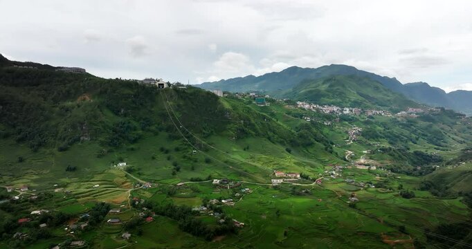 Sa Pa Fansipan Sun World cable car gondola ride over verdant valley, Vietnam