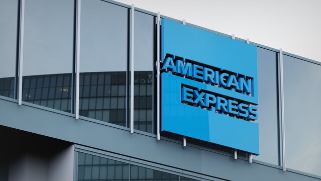 Manchester, UK - March 28, 2022 American Express only editorial Stock information on the logo of the office facade