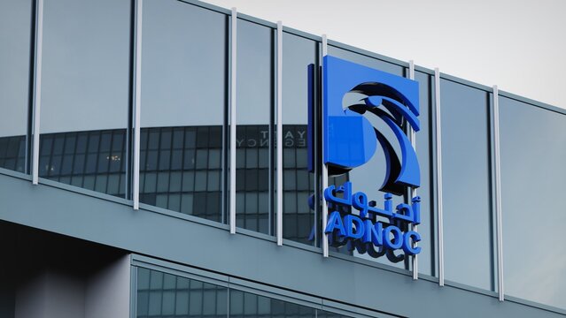 Manchester, UK - October 9, 2019 ADNOC only editorial Stock information on the logo of the office facade