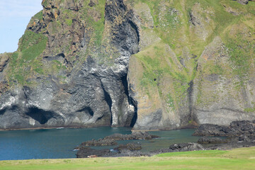 Iceland's rocky cliffs at the ocean