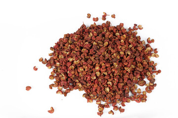 Close-up of Sichuan peppercorns on a white background