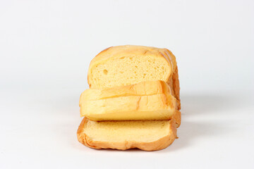 Sliced brioche on a white background