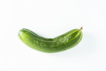 cucumber in the form of a smile on white