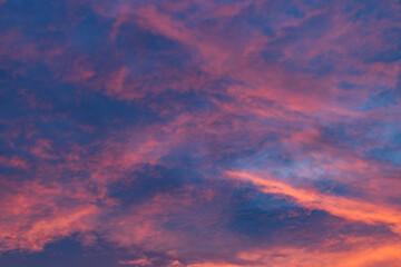 Blue and pink clouds on sky at sunset