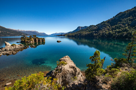 Calm Traful Lake and rock formations on Estancia Arroyo Verde