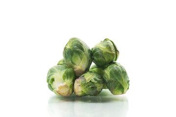 fresh raw brussels sprouts isolated on white background