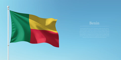 Waving Flag of Benin Against Clear Blue Sky Copyspace