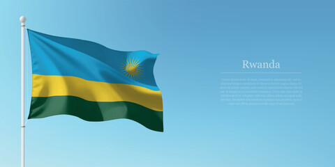Waving Flag of Rwanda Against Clear Blue Sky Copyspace