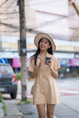 Fototapeta premium A woman wearing a straw hat