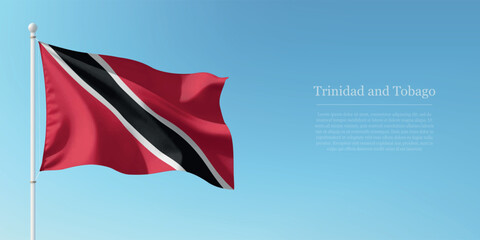 Waving Flag of Trinidad and Tobago Against Clear Blue Sky Copyspace