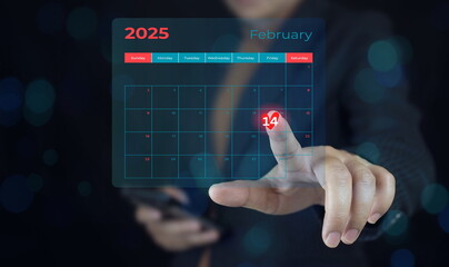 2025 14 February Businessman using pen to writing circle mark on virtual calendar agenda of booking and appointment meeting concept.