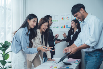 Collaborative Brainstorm: A diverse team of professionals engages in a lively brainstorming session, fostering collaboration, innovation, and creative problem-solving in a modern office setting.  