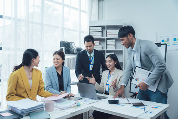 Collaborative Spirit: A team of diverse professionals engage in a lively discussion, showcasing their collaborative spirit and dedication to achieving shared goals.