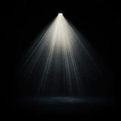 A light shining on a dark background