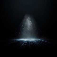 A dark background with a light shining on a spot