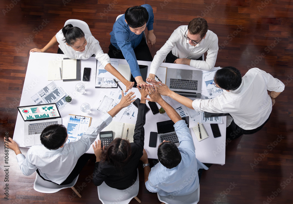 Poster top view diverse office worker join hand together in office room symbolize business synergy and stro