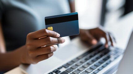 Shopping online - Woman holds a credit card to make an online purchase - Ecommerce