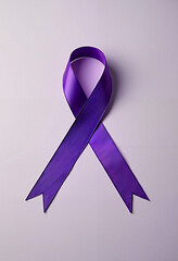 Purple ribbon symbolizing unity and hope for World Cancer Day awareness efforts in February