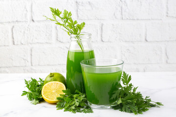 Green healthy detox, lemon and parsley juice. Green vegetable smoothie