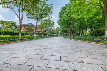 Empty brick floor and woods landscape in the park