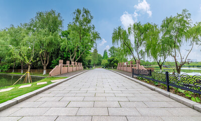 Empty brick floor and woods landscape in the park