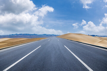 Empty asphalt road in the desert