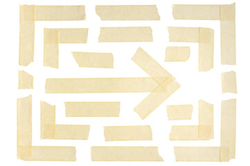 Duct tape and adhesive paper are arranged to form corners and arrow. Strips and pieces of wrinkled...
