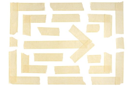 Duct tape and adhesive paper are arranged to form corners and arrow. Strips and pieces of wrinkled masking tape isolated on a transparent background.