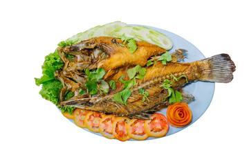 Pla Tod Num pla.Deep Fried Sea Bass with Fish Sauce, Fried Fish, Thai style, spicy mango sauce.isolation and whitebackground