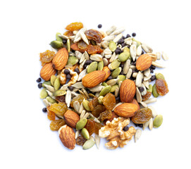 Heap of different tasty nuts isolated .Assorted Nuts. Pistachios, Almonds, Hazelnuts, walnuts, Cashews falling set, isolated. Assorted nuts mix floating on white background. Fresh dry fruits isolated.