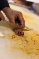 Fresh Stuffed Meat Roll Being Sliced – Highlighting Fine Ingredients and Cooking Techniques