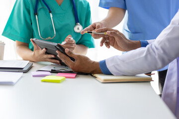 Meeting of doctors and medical personnel in hospitals to discuss research on disease treatment.