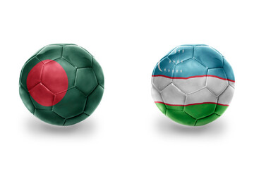 football balls with national flags of uzbekistan and bangladesh, soccer teams. on the white background.