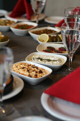 A colorful and appetizing mezze platter featuring hummus, baba ghanoush, and other Middle Eastern favorites, perfect for food blogs and recipe websites