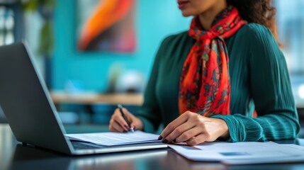 The Woman with Laptop and Papers