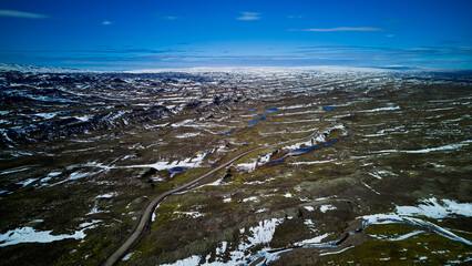 Winding Road and Expansive Landscape of Icelandic Highlands