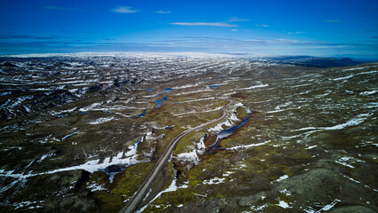 winding road and expansive landscape of icelandic highlands