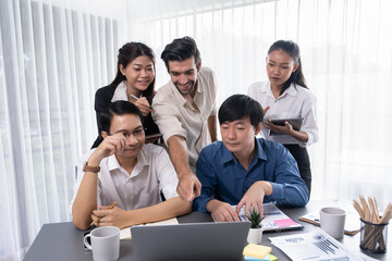 Fototapeta premium Data analysts team of office worker collaborate on business intelligence BI dashboard to analyze financial, trend, and marketing data. BI software utilization drive business success. Prudent